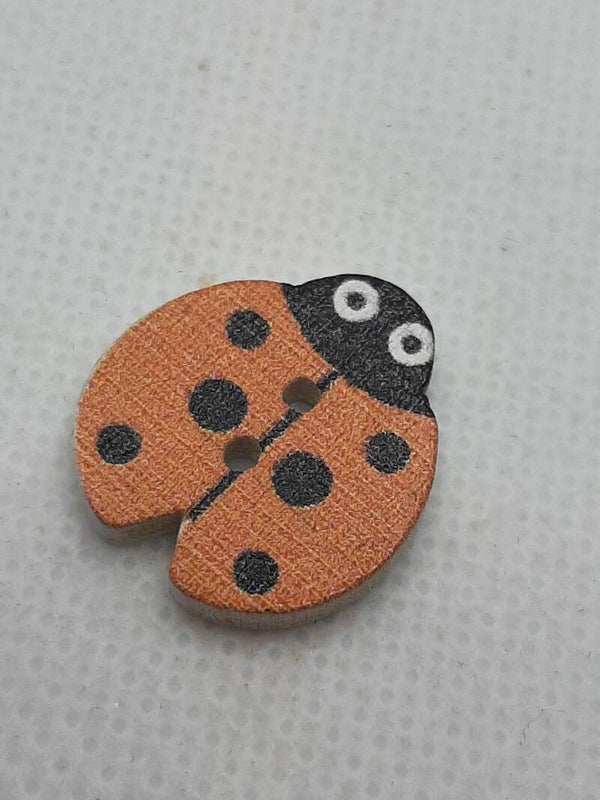 Knoop lieveheersbeestje oranje