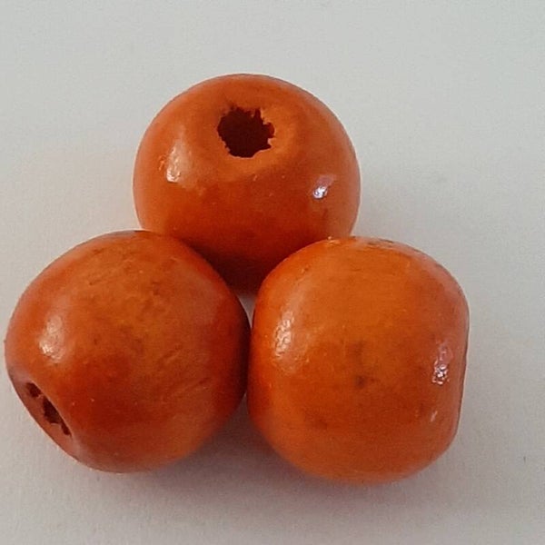 Houten kraal 14 x 13 glanzend oranje