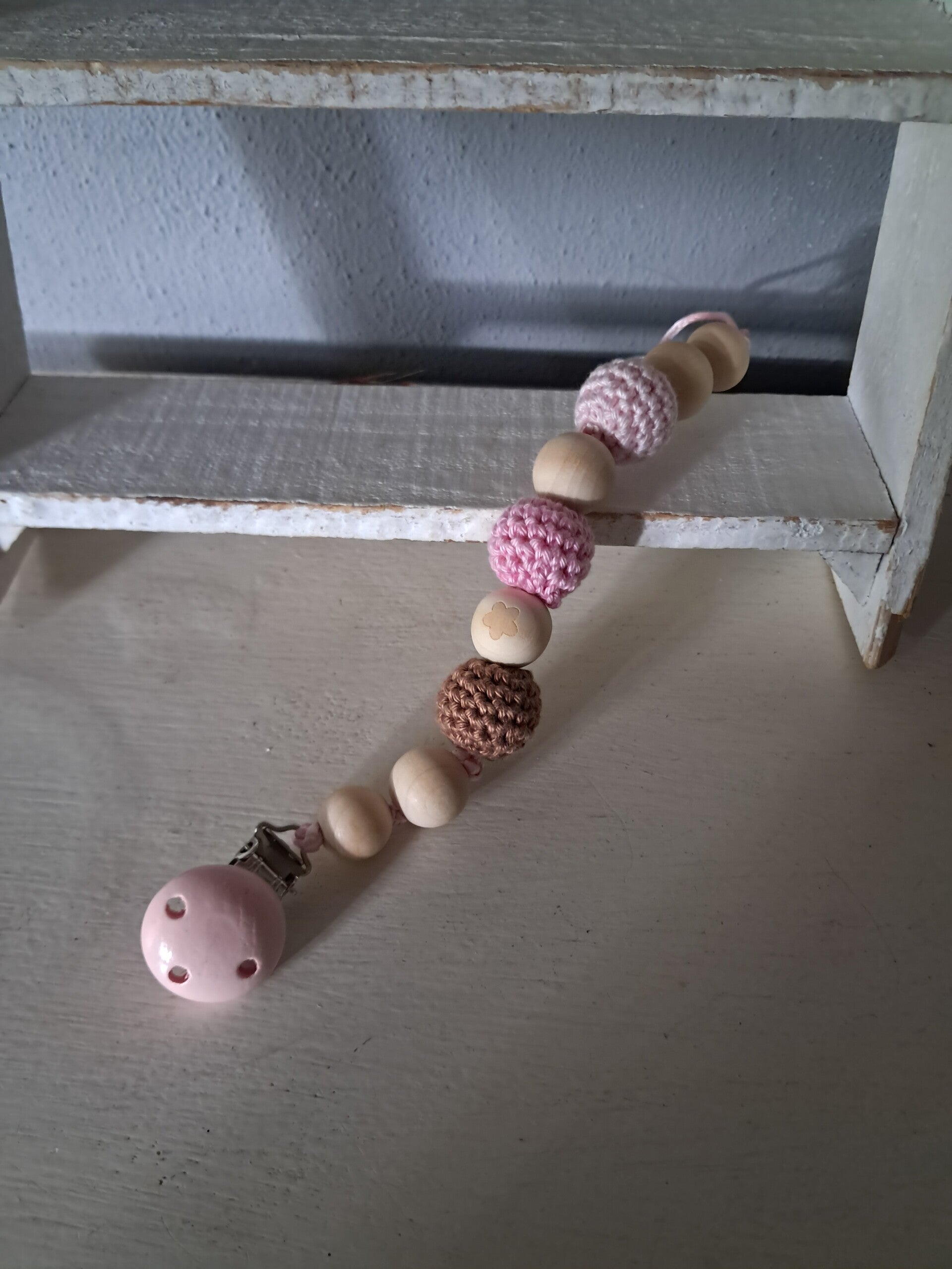 Speekoord hout oud roze