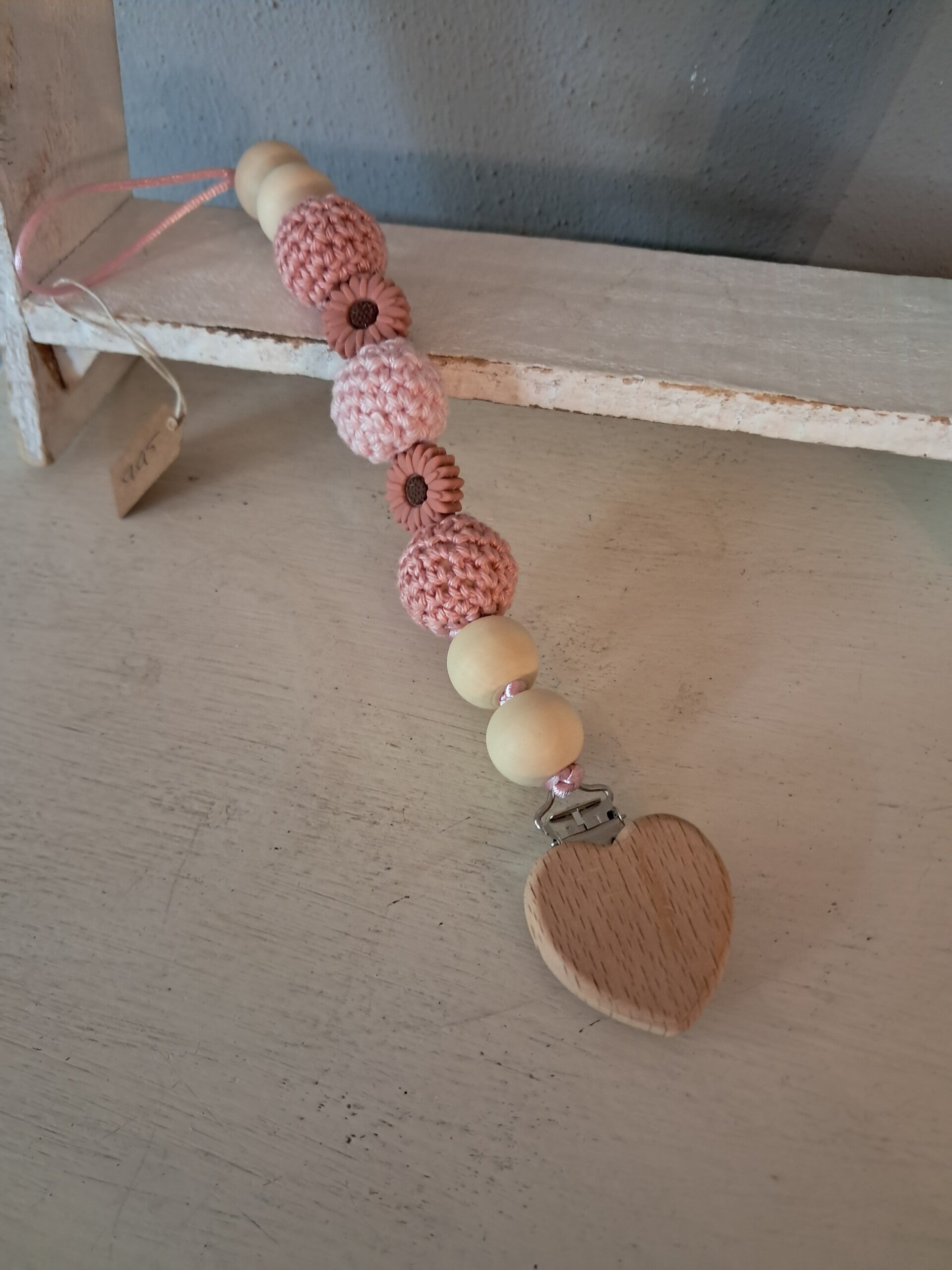 Speenkoord oud roze roze bloem