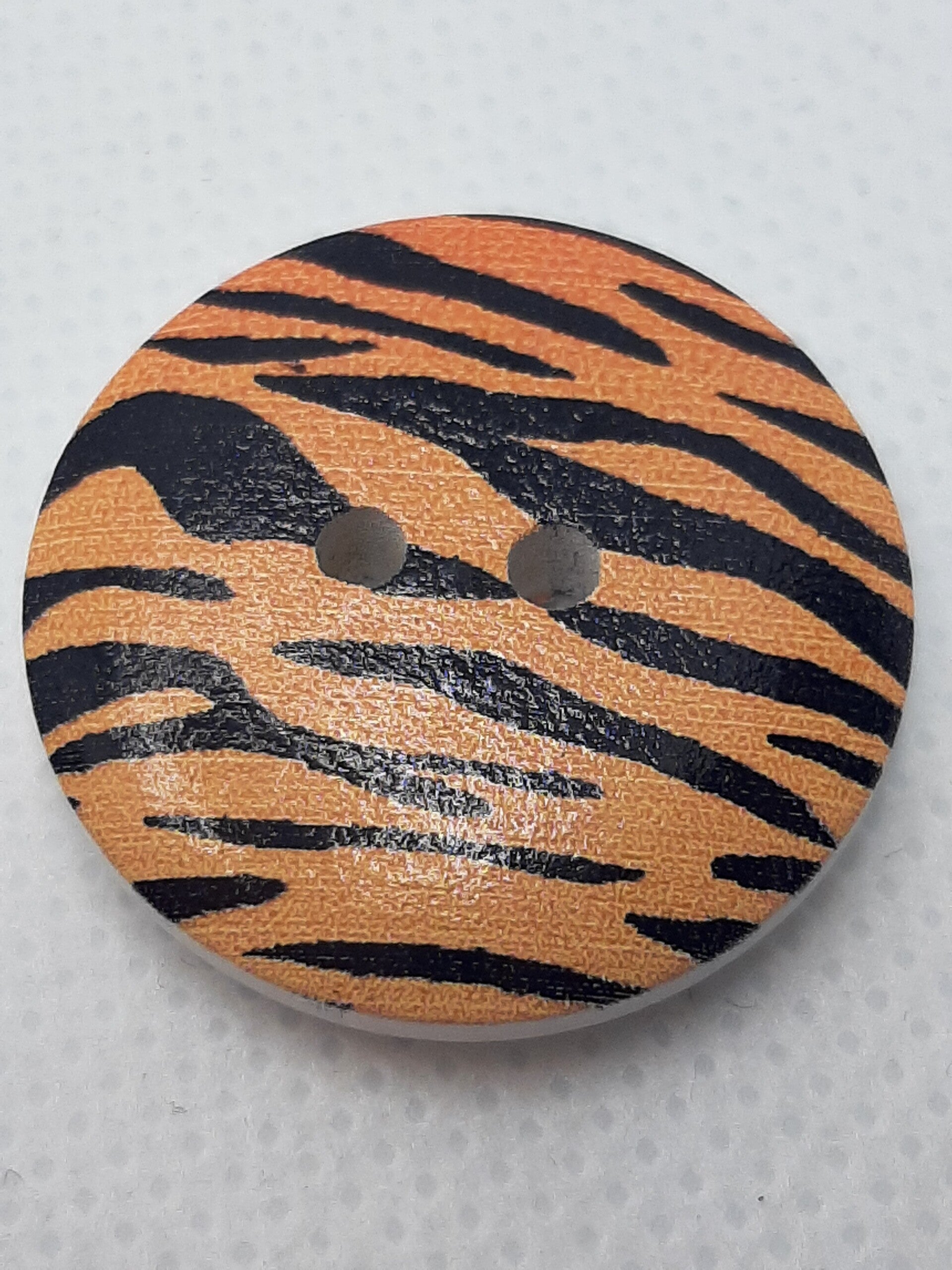 Knoop 25 mm tijger oranje (6)