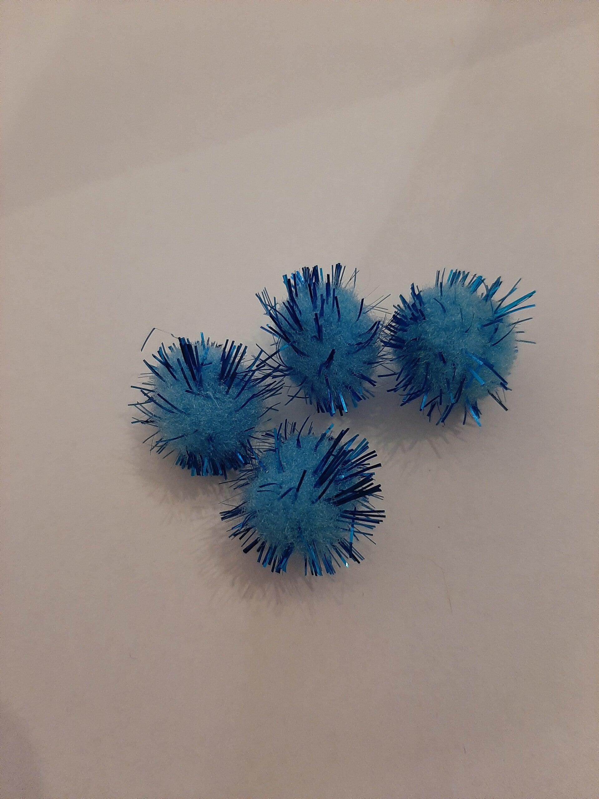 Pompom licht blauw glitter 15 mm