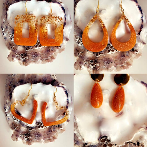 Unieke epoxy oranje oorbellen