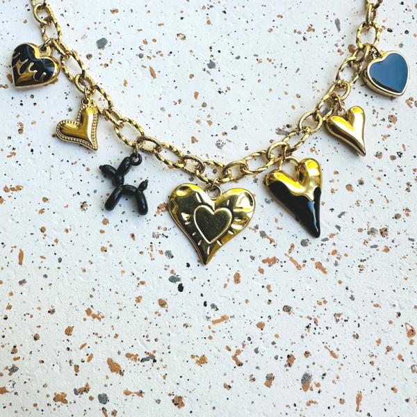 Hartjes bedelketting black gold