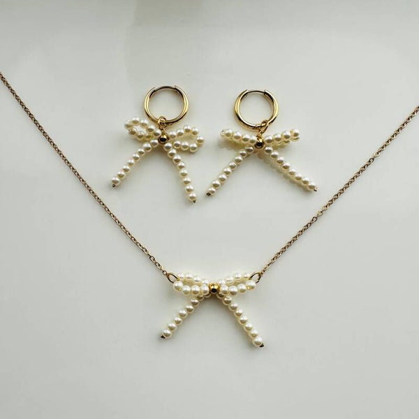 Strikje ketting+oorbellen set