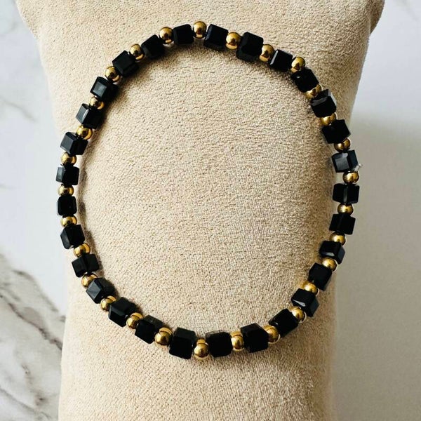 Stretch armband black gold