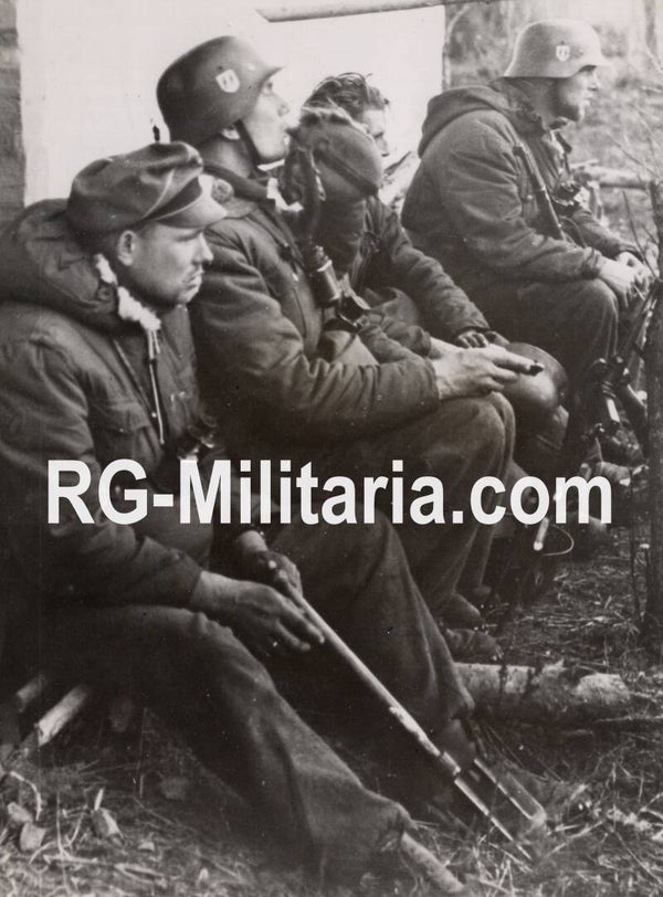Original WW2 German Waffen SS Press Photo - Waffen SS soldiers resting before the battle near Kyiv Shitomir, Ukraine (1943)