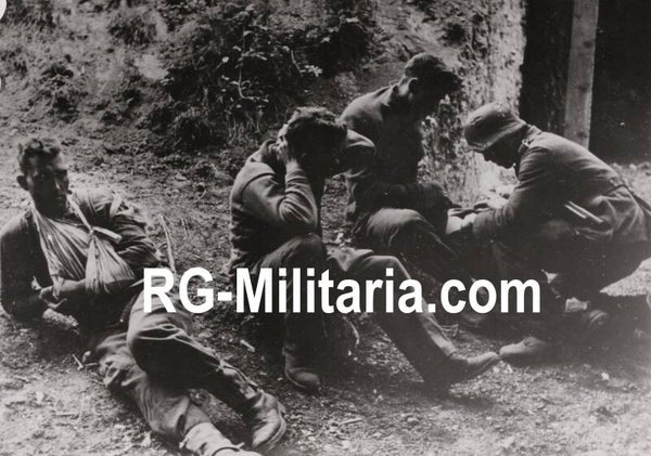 Original WW2 Belgian Press Photo - German medics taking care of wounded British soldiers in Trouville, Normandy, Operation Overlord, D-Day (1944)