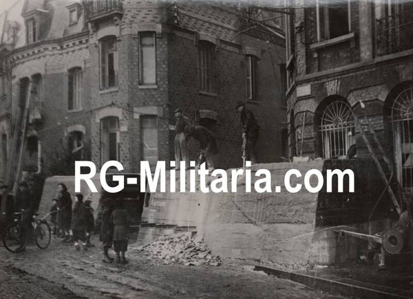 Original WW2 French Press Photo - Civilians removing bunker walls near the French coast