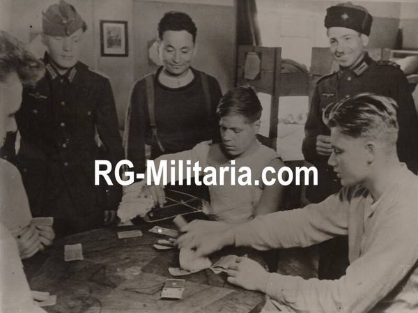 Original WW2 German Press Photo - Ostvolker Wehrmacht volunteers in their barracks (1943)