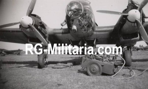 Original WW2 German Photo - Heinkel He 111 loading bombs at Fliegerhorst Schiphol, Amsterdam (1940)