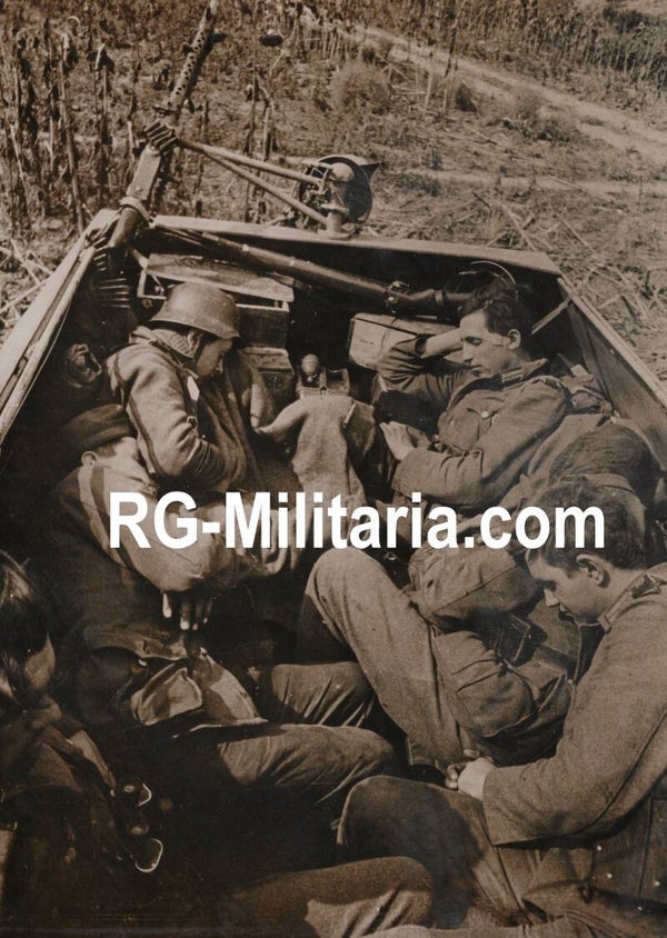 Original WW2 German Press Photo - Panzergrenadiere Division Grossdeutschland resting after the fight in a panzer truck (1943)