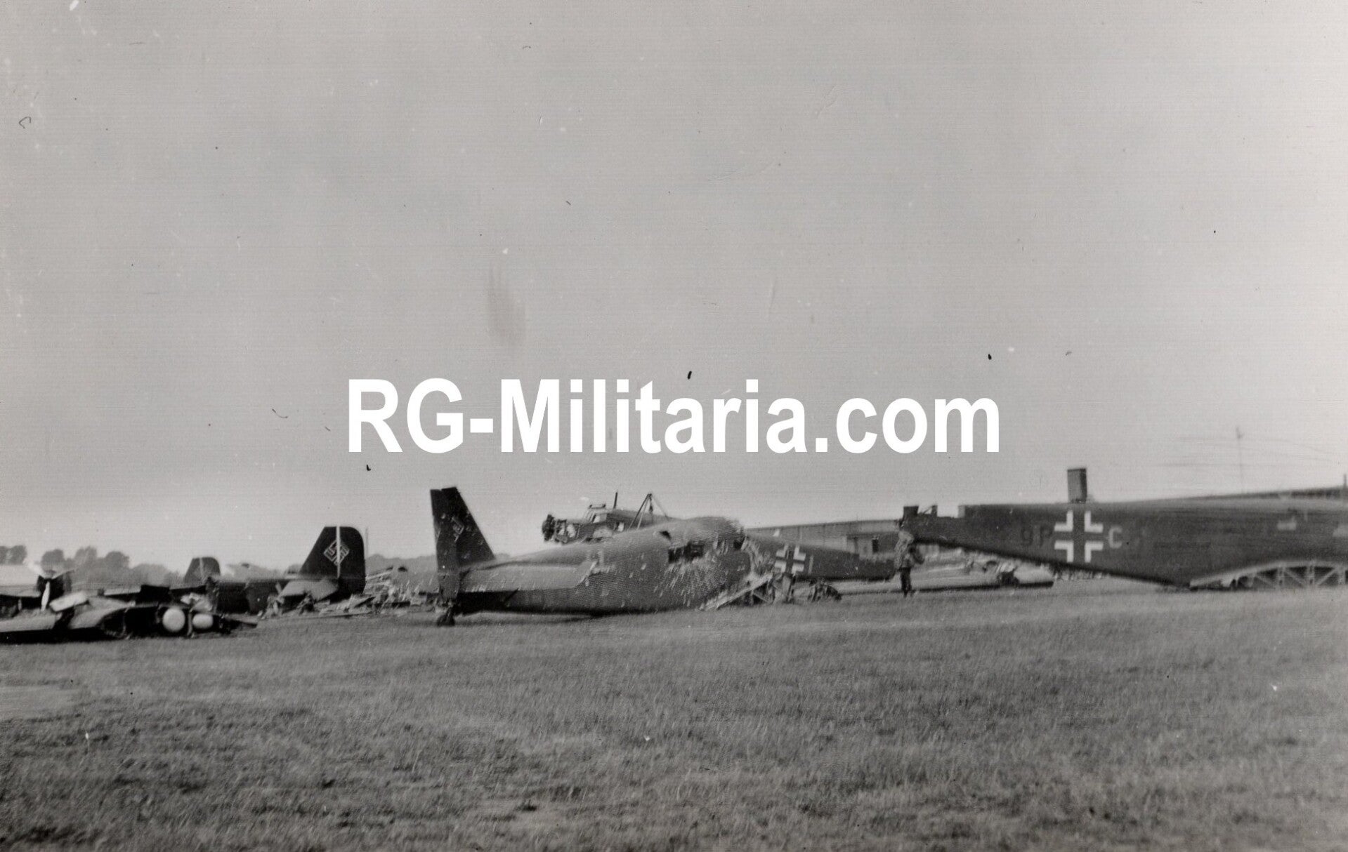 Original WW2 German Photo - Destroyed Junkers Ju 52 airplanes at the Rotterdam airfield, Waalhaven, Holland (1940)