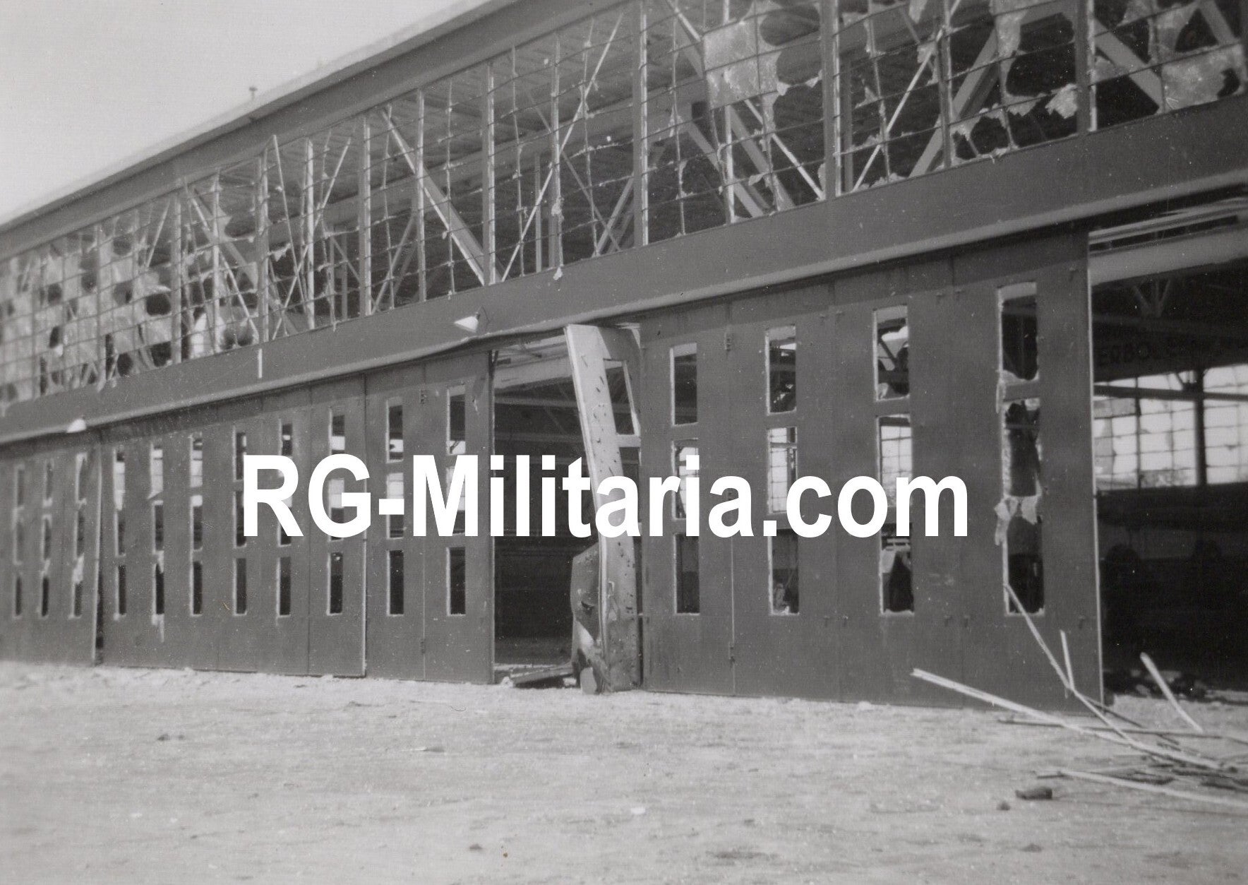 Original WW2 German Photo - Damaged hangar at the Dutch LVA airfield of Bergen, Holland (1940)