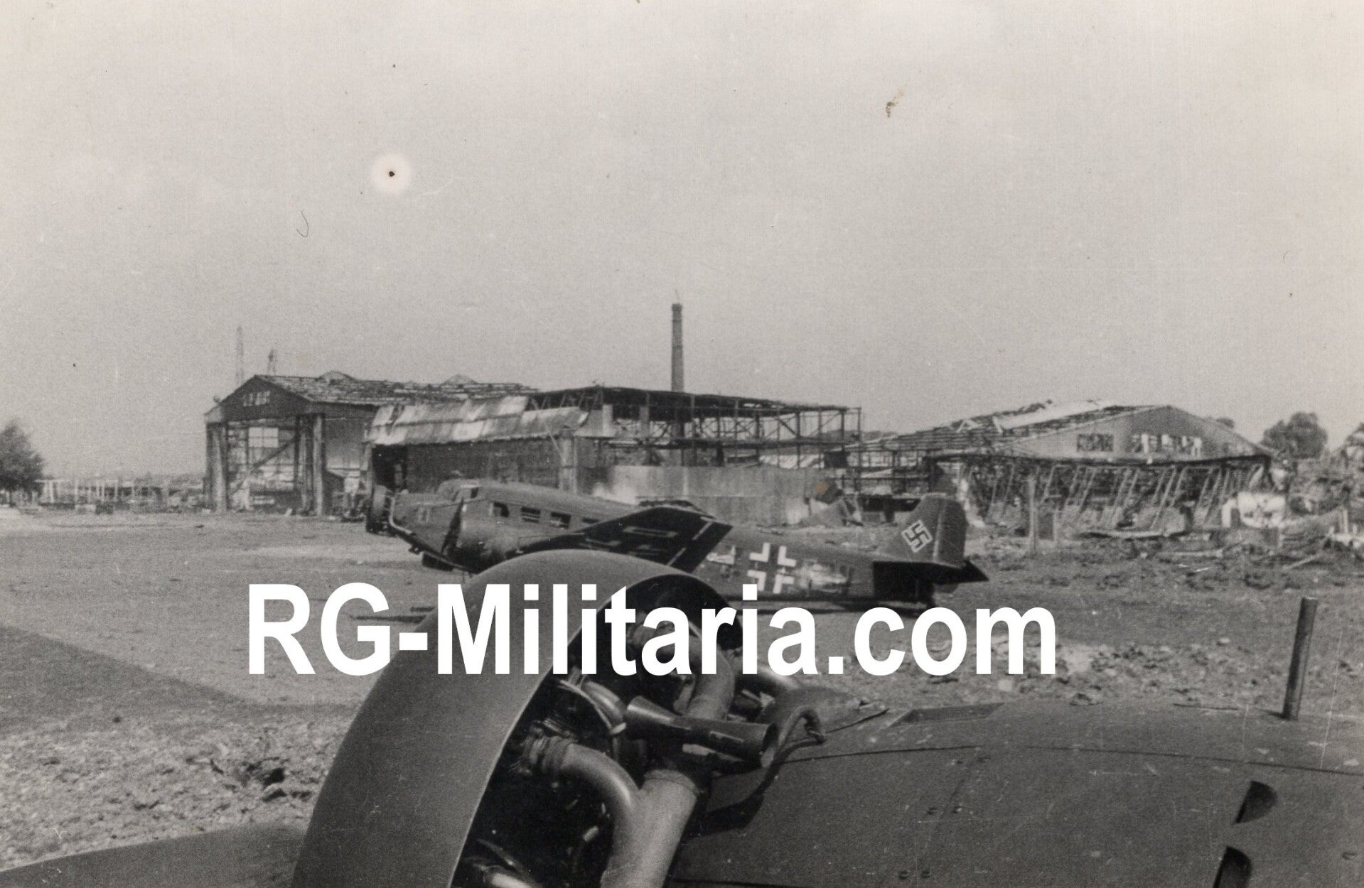 Original WW2 German Photo - Junker JU52 airplanes in front of the burned hangar at the Rotterdam airfield, Waalhaven, Holland (1940)