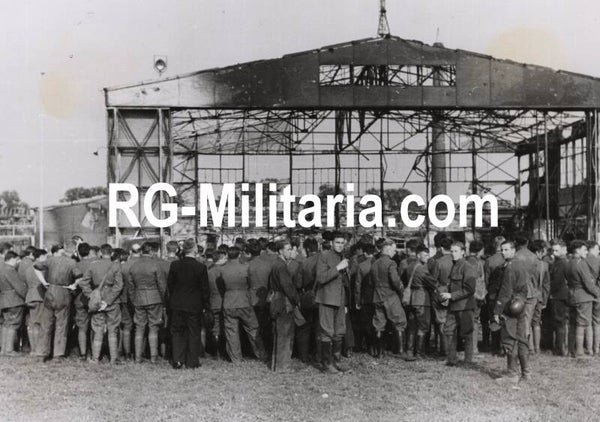 Original WW2 German Press Photo - German and Dutch soldiers in front of the burned hangar of the Rotterdam airport Waalhaven, Holland, May (1940)