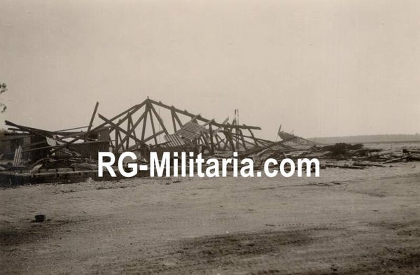 Original WW2 German Photo - Damage at Fliegerhorst Gilze Rijen, with a Fokker C V in the background, Holland, May (1940)