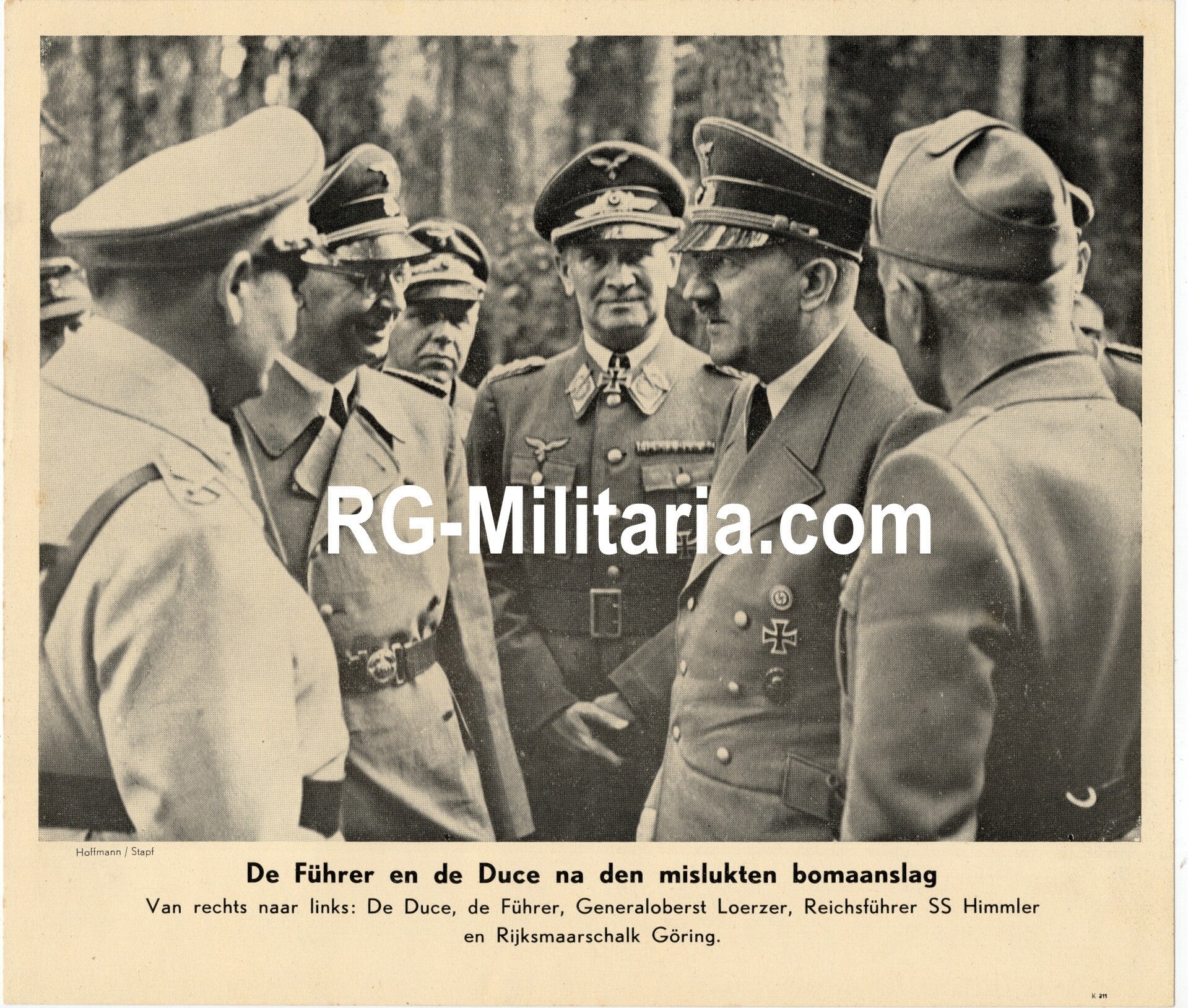 Original WW2 Dutch Bilderdienst Press Photo - Adolf Hitler talks to Himmler, Göring, Mussolini and Loerzer after the failed assasination attempt, July (1944)