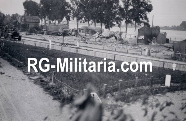 Original WW2 German Photo - German soldiers driving past destroyed houses at Moerdijk, Rotterdam, Holland, May (1940)