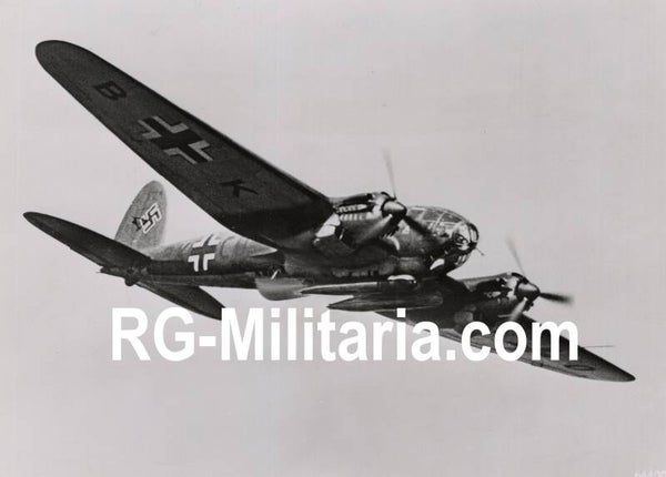 Original WW2 German Press Photo - Luftwaffe airplane Heinkel He 111 with bombs (1941)