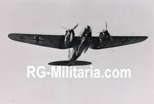 Original WW2 German Press Photo - Luftwaffe airplane Heinkel He 111 with bombs (1941)
