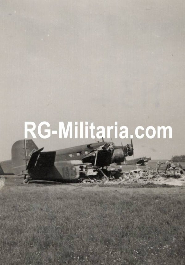Original WW2 German Photo - Destroyed Junkers Ju52 airplane on the Rotterdam airfield Waalhaven, Holland (1940)
