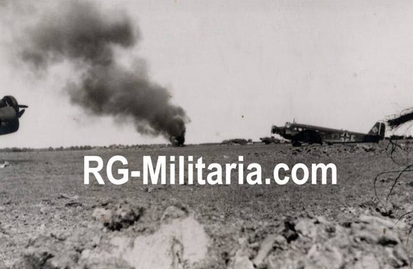 Original WW2 German Photo - Burning Junker JU 52 airplanes at the Rotterdam airfield Waalhaven, Holland, May (1940)