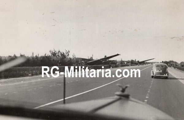 Original WW2 German Press Photo - Rijksweg near Delft with landed Junkers JU 52 airplane, Blitzkrieg May, Holland (1940)