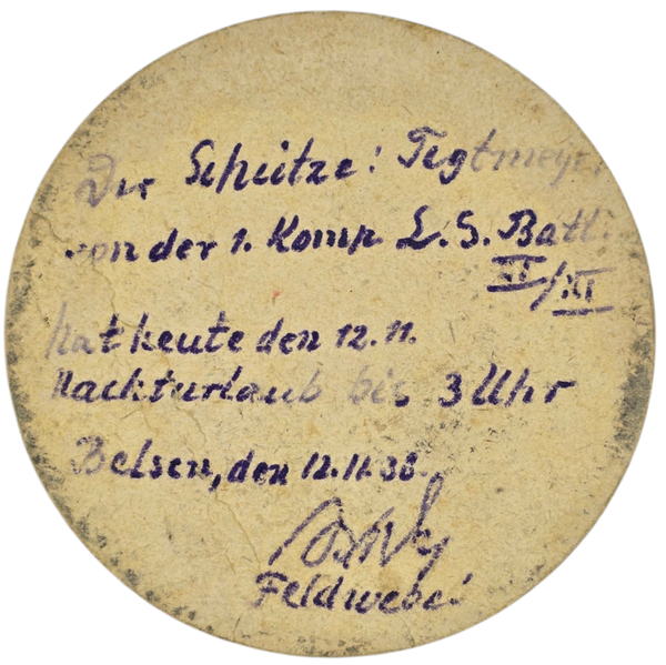 Original WW2 German Document  - Luftschutz Ausweis Nachturlaub Belsen on a beer mat (1938)