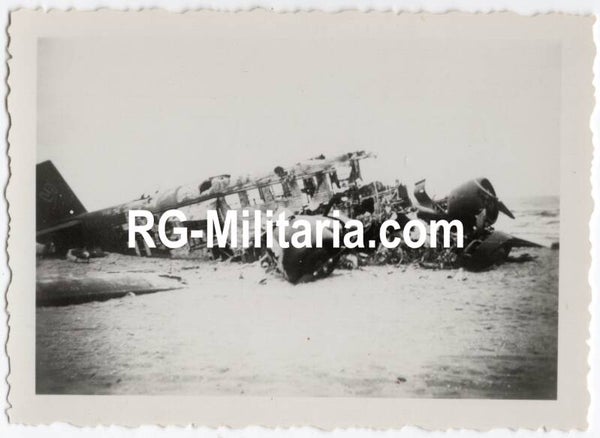 Original WW2 German Photo - Crashed Junkers JU 52 on a beach near Valkenburg, Holland, May (1940)