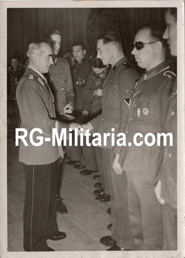 Original WW2 German Press Photo - Wounded soldiers receiving the DRL Sportabzeichen by Reichssportführer Von Tschammer und Osten (1942)