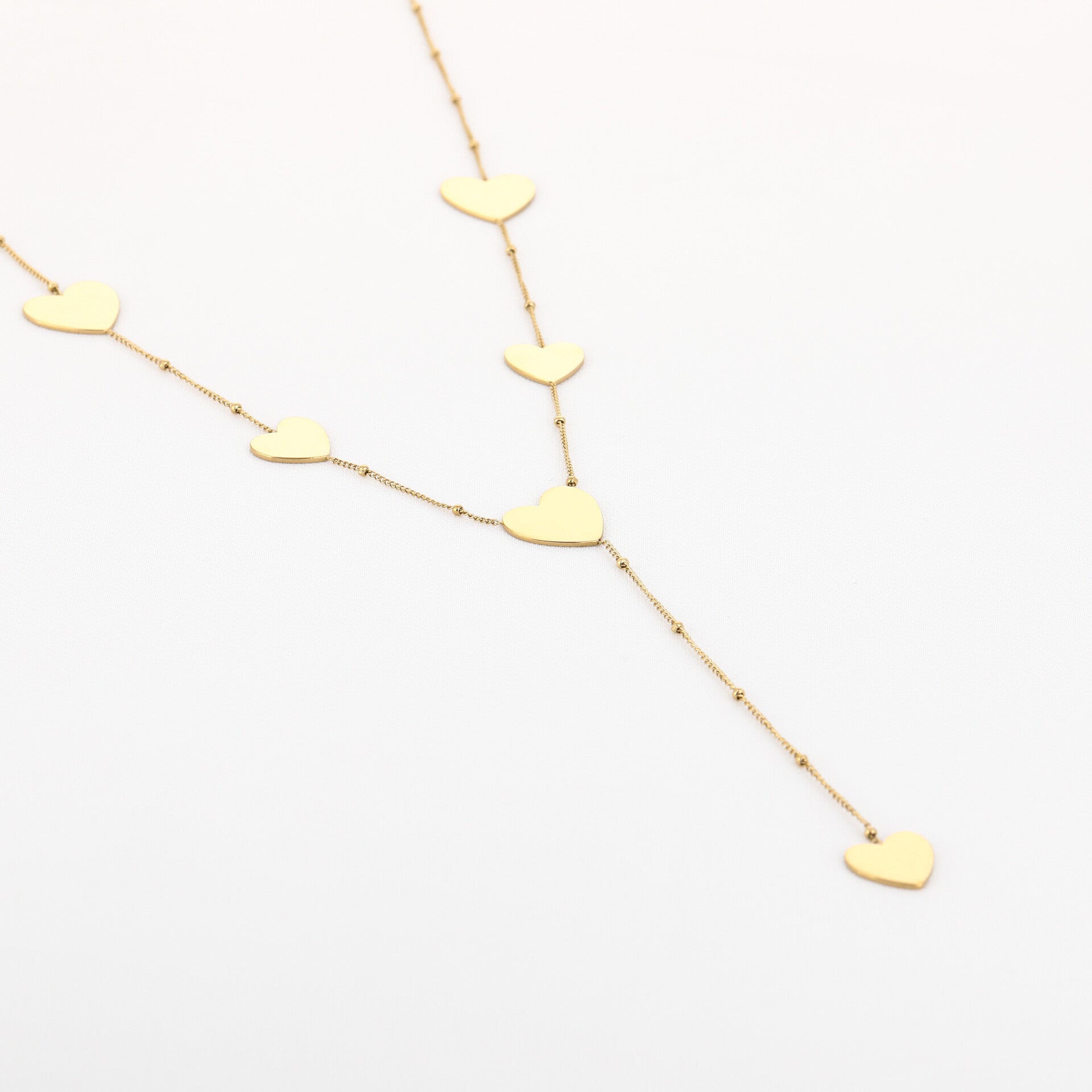 Y ketting hartjes - goud