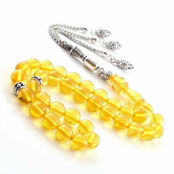 Drop amber with silver tassel