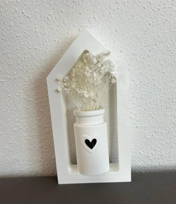 Haus mit Vase