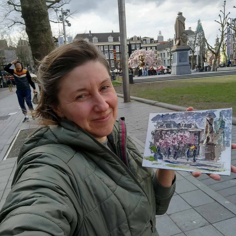 Art walk in Amsterdam during Magnolia blossom. Artist Julia Grechkina