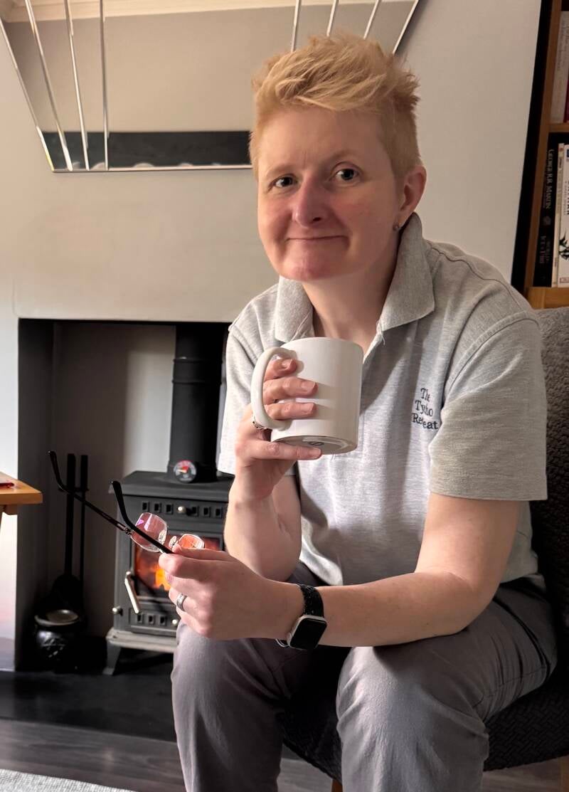 Toni, founder of The Tycho Retreat, in her wellbeing practice space