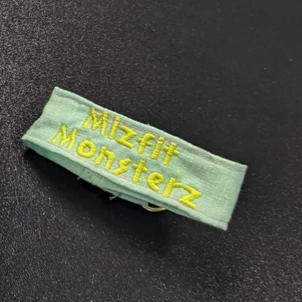 Mizfit Monsterz Wristlet/Extra Badge