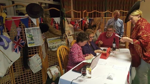 A busy tote desk at a club race night
