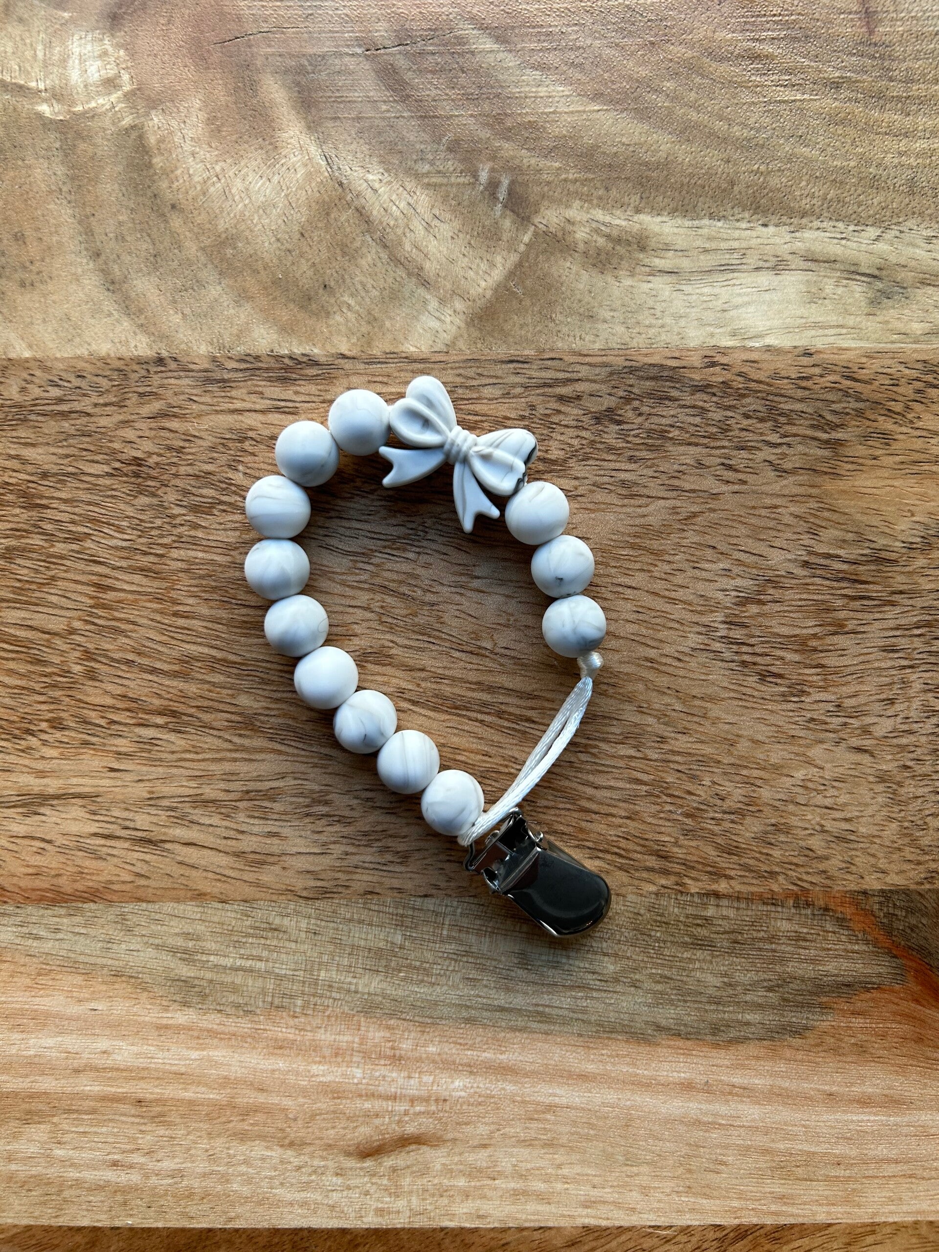 Tuttinauha, rusetti, marmori