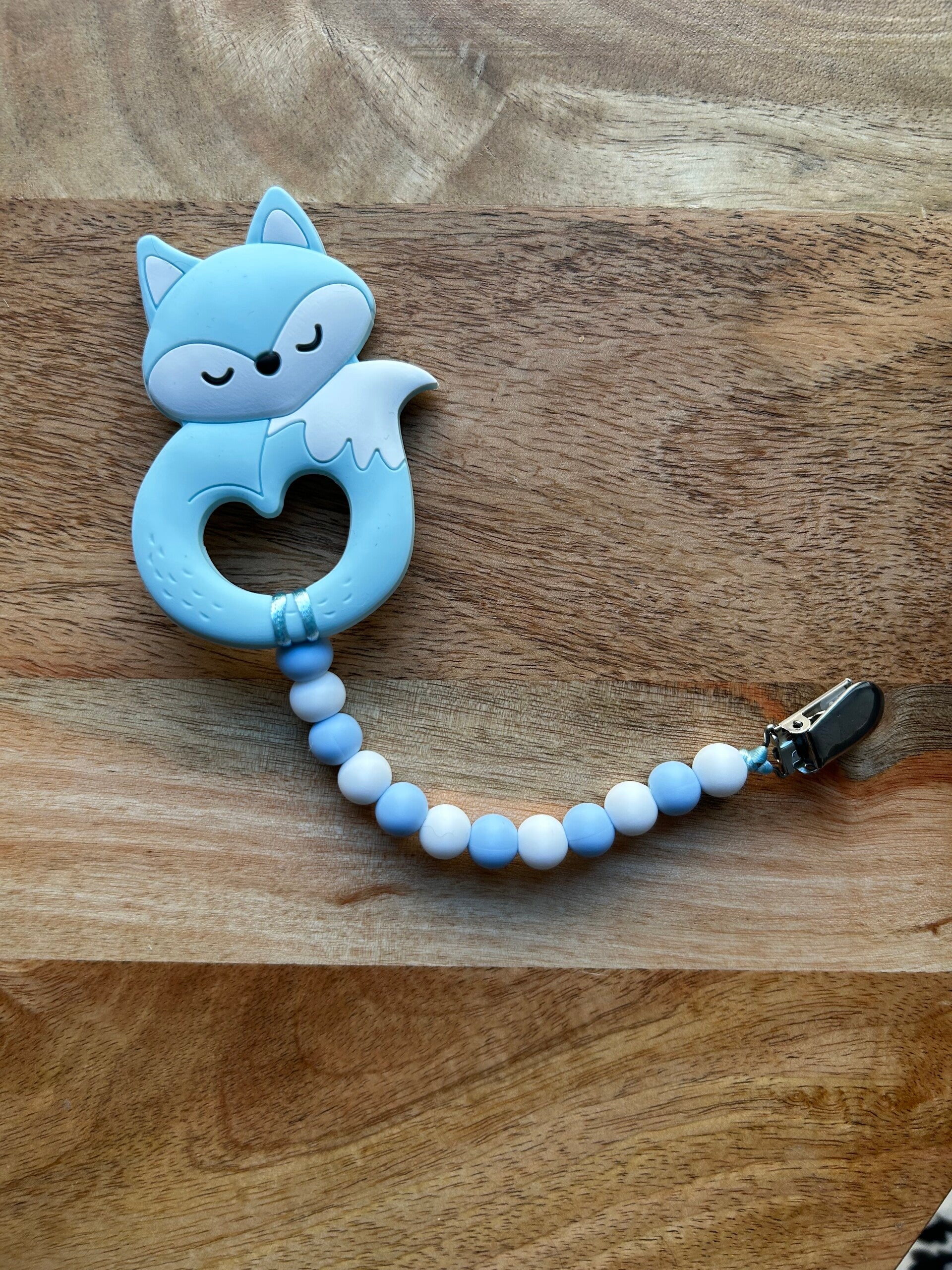 Purulelu, kettu kerällä