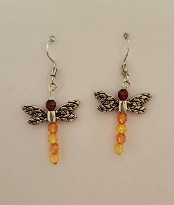 Libellule argent et orangé