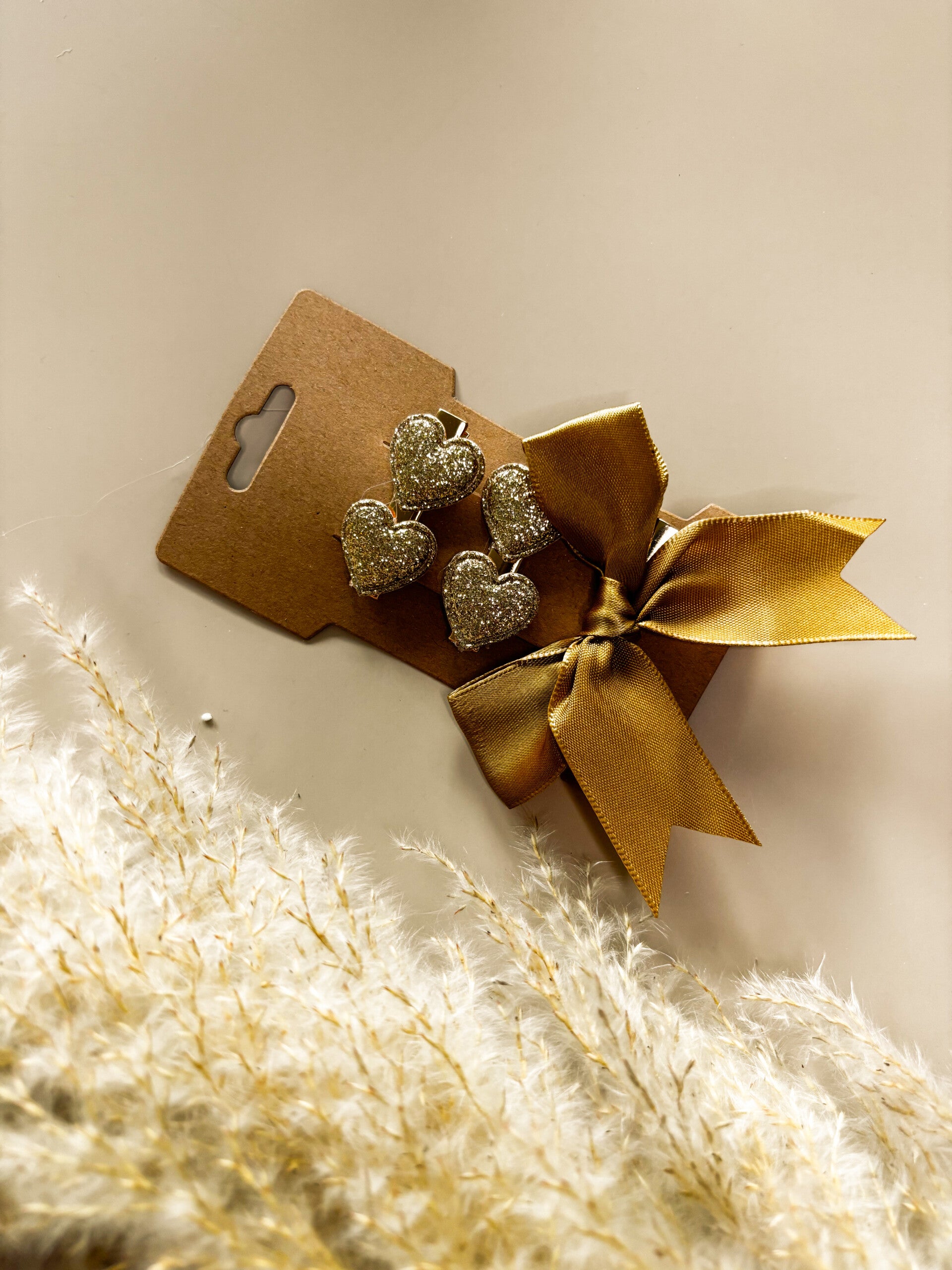 Haarknipjes goud en elastiek strik