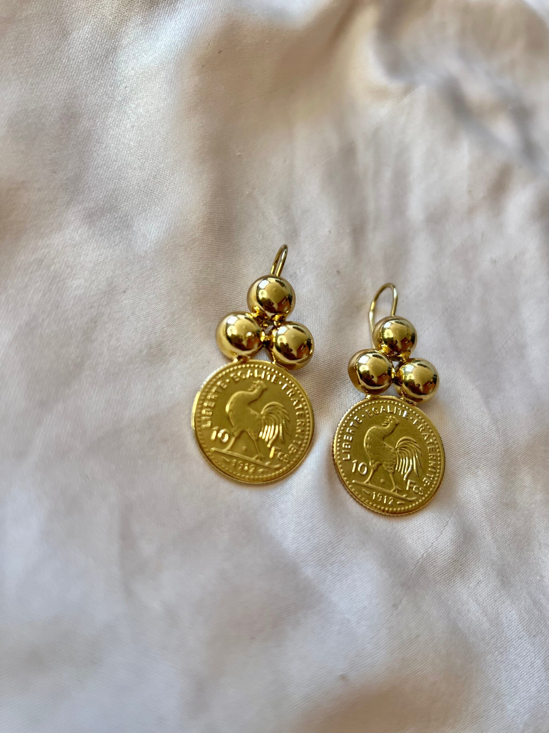 Boucle d’oreille coq