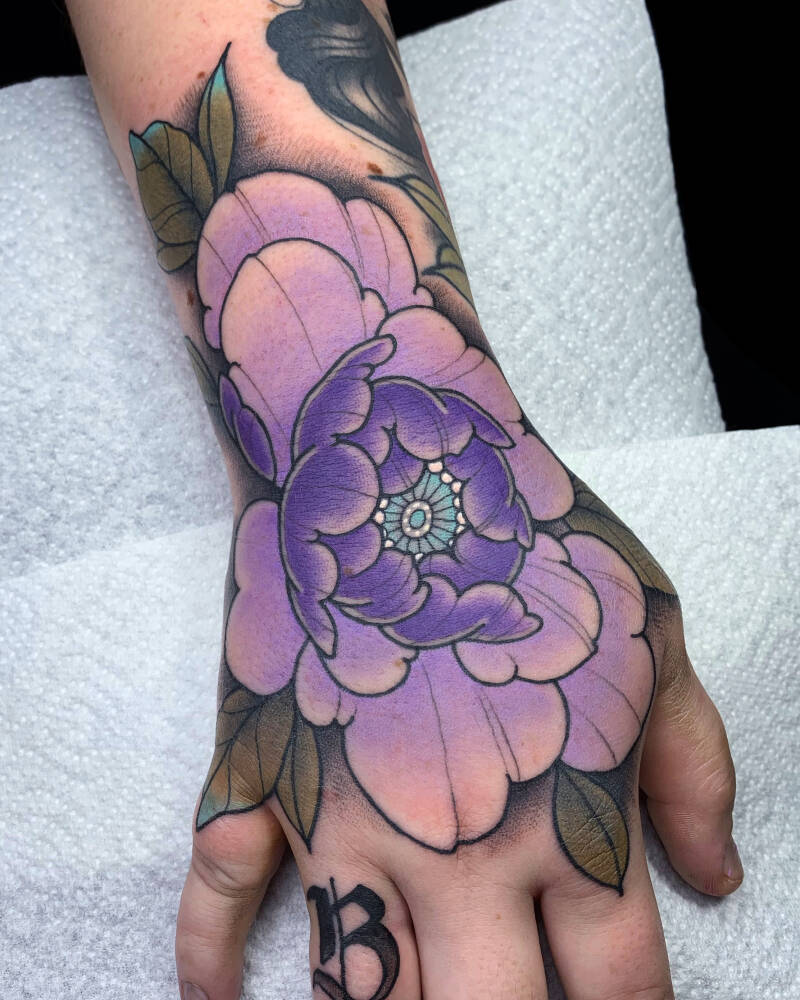 selinactattoopeonyhand.jpg