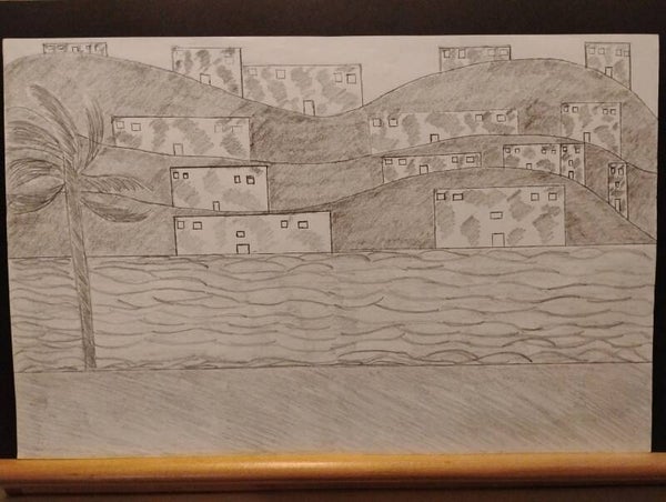 river near houses in the hills