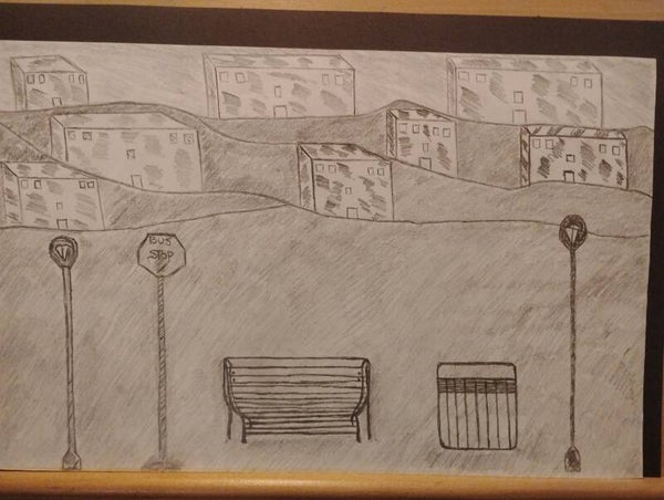 The bus stop near the houses in the hills