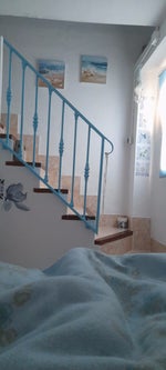 Double bedroom view stairs to roof terrace
