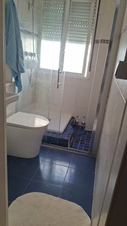 Bathroom with shower sink and toilet