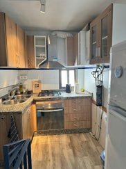 Wooden fitted kitchen in beautiful townhouse