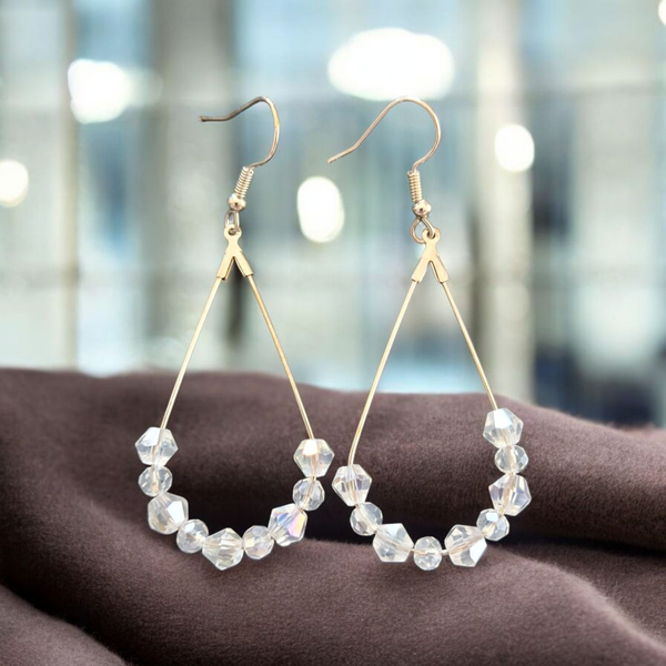 Boucles d'oreilles - Perles transparentes multifacette